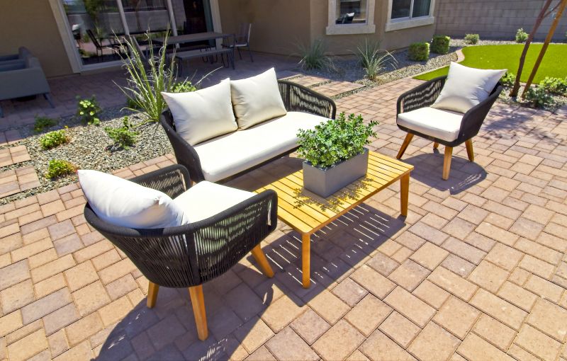 Concrete paver patio with seating area